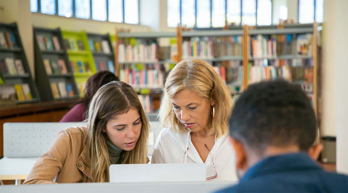 Some people using the library computers